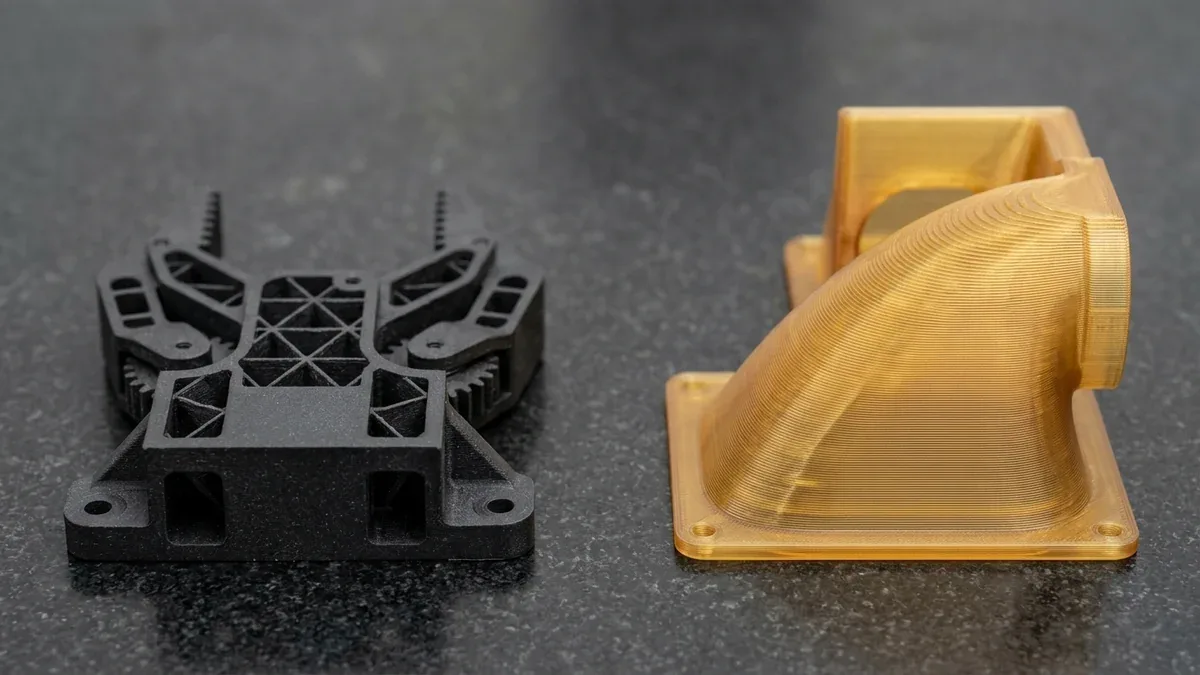 Industrial FDM 3D printed carbon-fiber reinforced nylon robotic gripper arm and high-temp Ultem aerospace air duct
