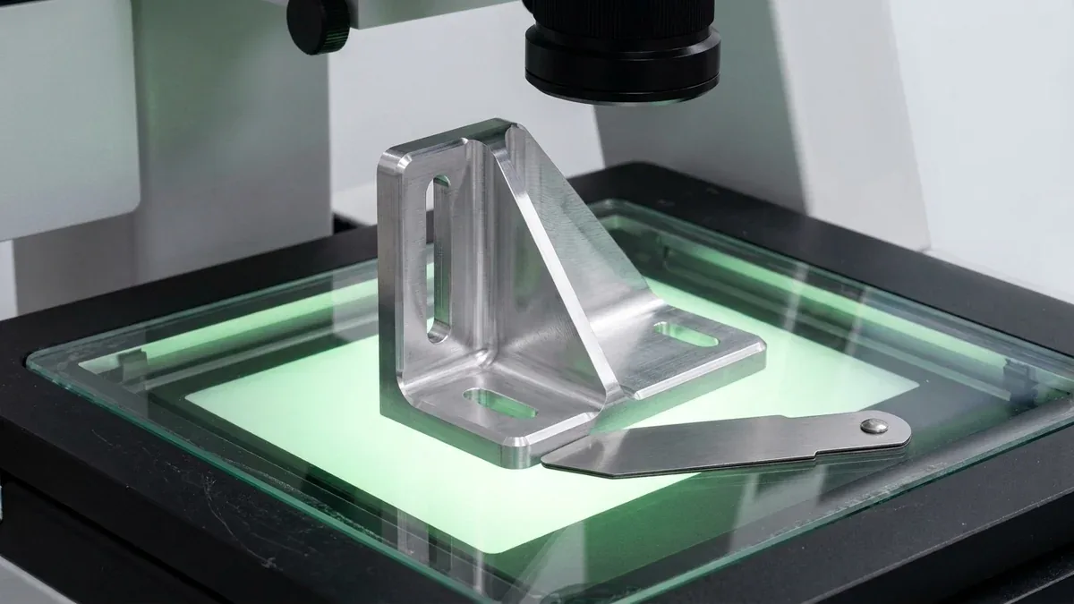 Optical comparator and metrology inspection measuring internal fillet radii on aerospace bracket