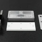 CNC turned 316L shaft on V-blocks with 6061 aluminum enclosure and other precision prototype parts