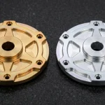 CNC machined 6061-T6 aluminum rotary servo flanges comparing golden Type I and clear Type II chromate conversion coating